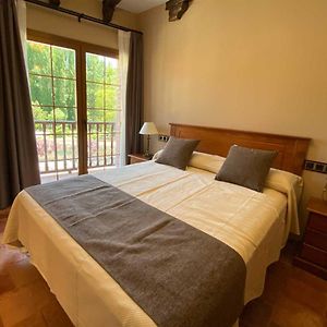 Habitación con Cama Queen Adaptada para Discapacitados